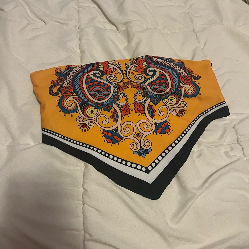 Bandeau style swim top with pads inside.